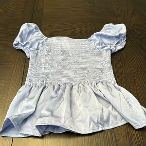 Suprelook size medium light blue satiny shirt with ruffles